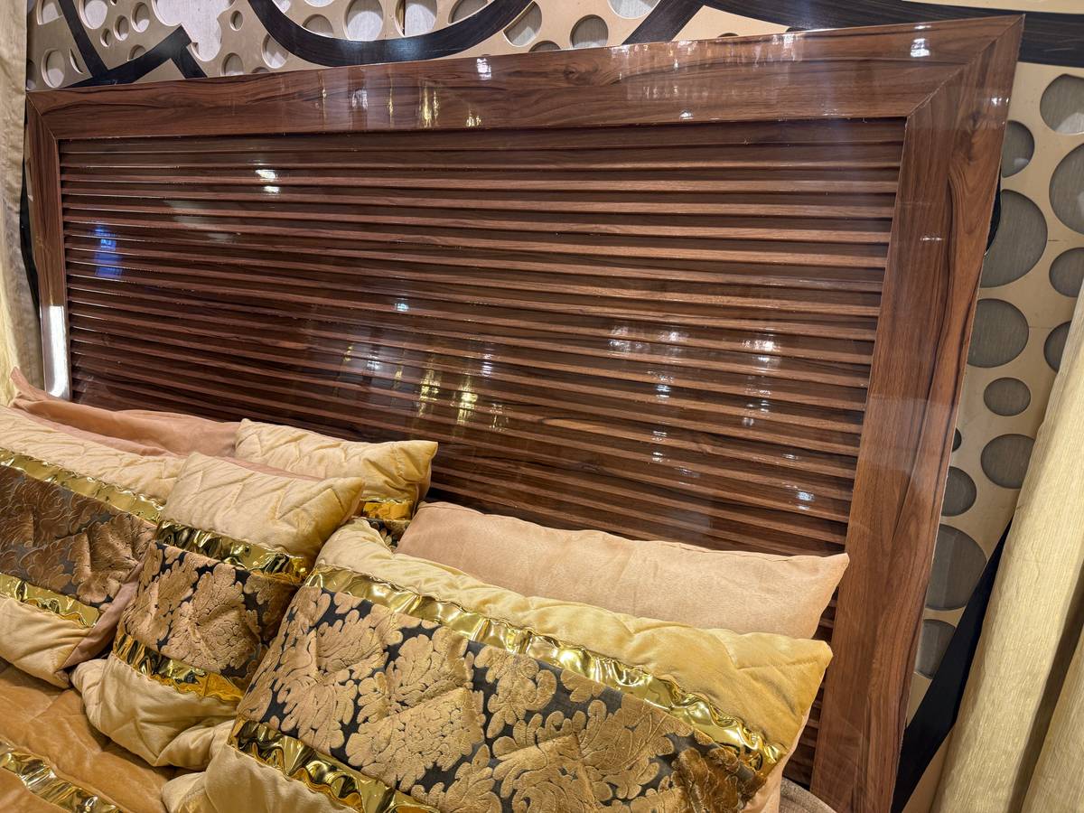 Elegant King Size Wooden Bed with Plush Bedding