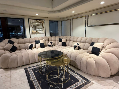 Luxurious Plush Curved Sofa with Accent Pillows