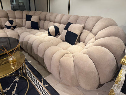 Luxurious Plush Curved Sofa with Accent Pillows