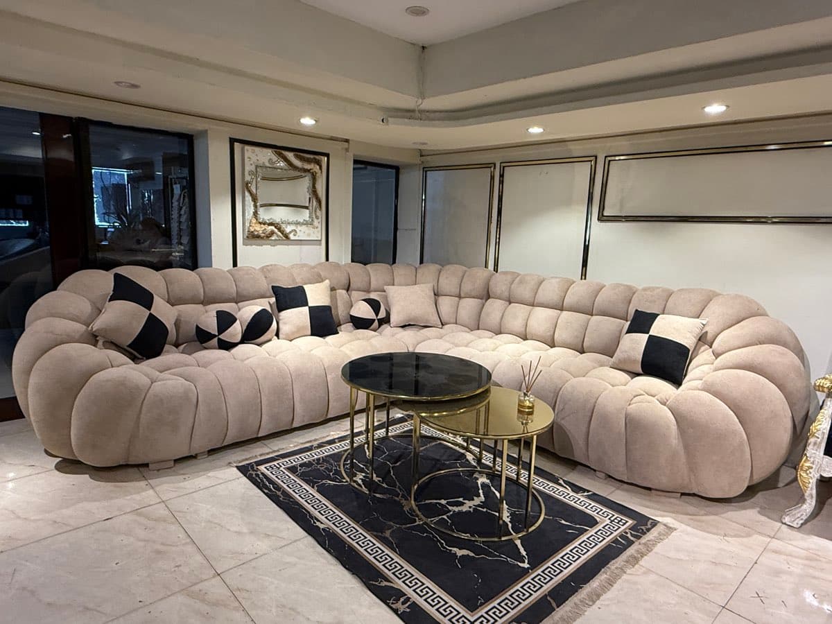 Luxurious Plush Curved Sofa with Accent Pillows
