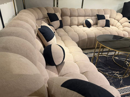 Luxurious Plush Curved Sofa with Accent Pillows