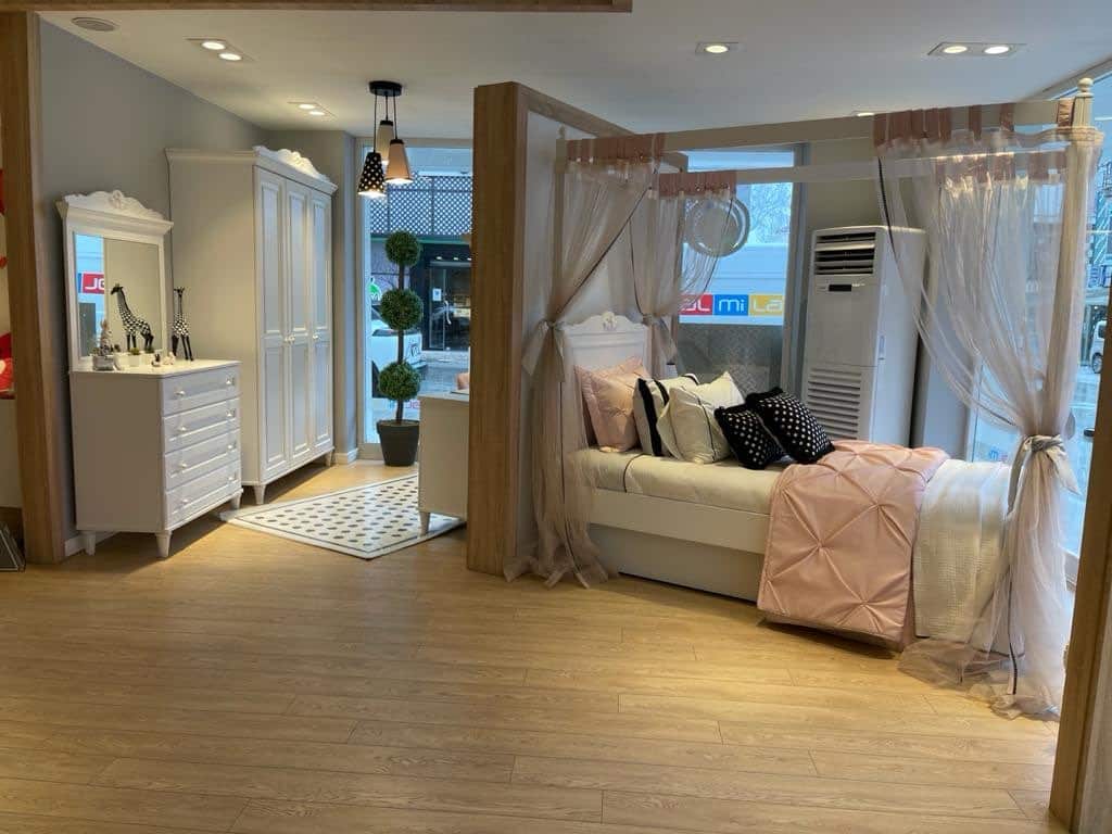 Elegant Canopy Bed with Decorative Drapes