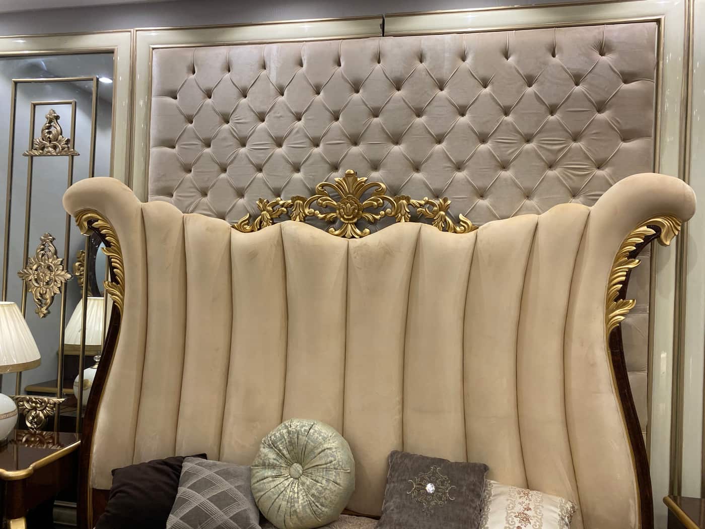 Luxurious King-Size Upholstered Bed Set with Ornate Mirror and Nightstands