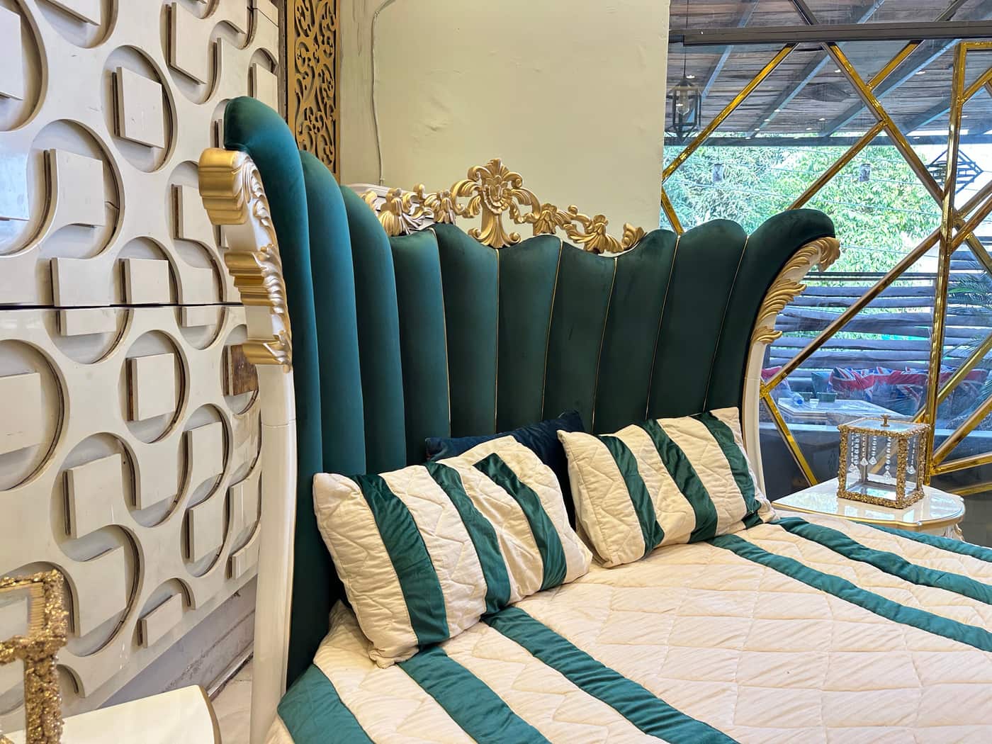 Luxurious Emerald Green Velvet Bed with Elegant Curved Headboard